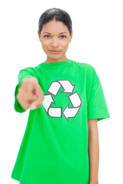 Relaxed model wearing recycling tshirt pointing at camera — Stock Photo, Image