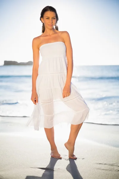 Cheerful woman in white summer dress posing — Stock Photo, Image