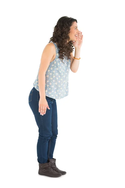 Smiling attractive brunette telling secret — Stock Photo, Image