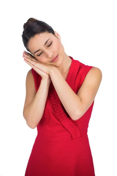 Sexy brunette in red dress resting — Stock Photo, Image