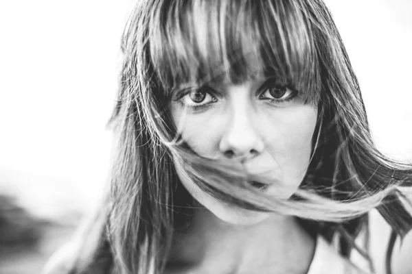 Hipster girl with fringe staring at camera — Stock Photo, Image