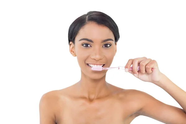 Pretty natural model using toothbrush — Stock Photo, Image