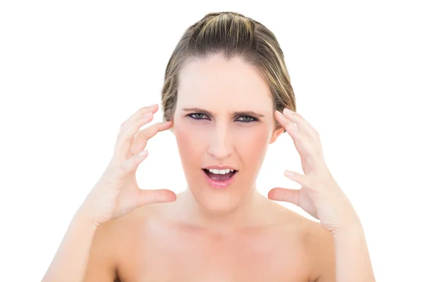 Woman looking angry at camera — Stock Photo, Image