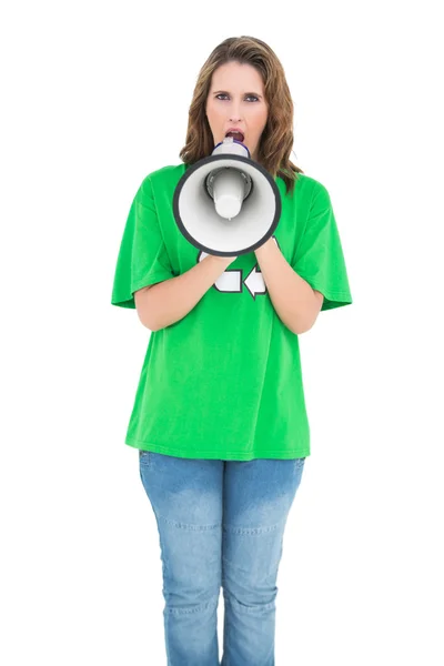 Attractive environmental activist screaming in a megaphone — Stock Photo, Image