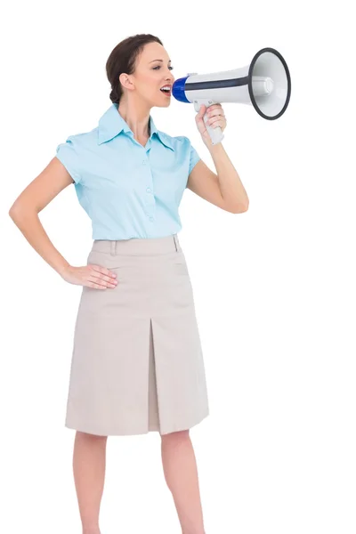 Peaceful classy businesswoman talking in megaphone — Stock Photo, Image