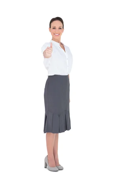 Elegant businesswoman posing thumb up — Stock Photo, Image