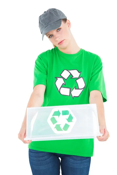 Stern pretty environmental activist holding an empty recycling box — Stock Photo, Image