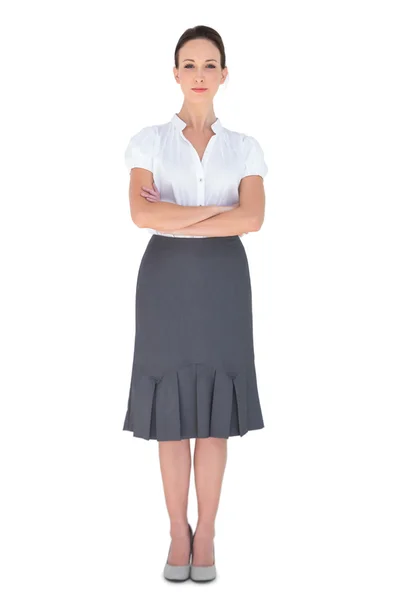 Peaceful businesswoman posing crossing arms — Stock Photo, Image