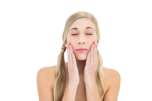 Natural young blonde woman posing with closed eyes — Stock Photo, Image