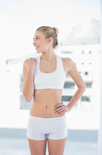 Pretty young blonde model posing looking away — Stock Photo, Image