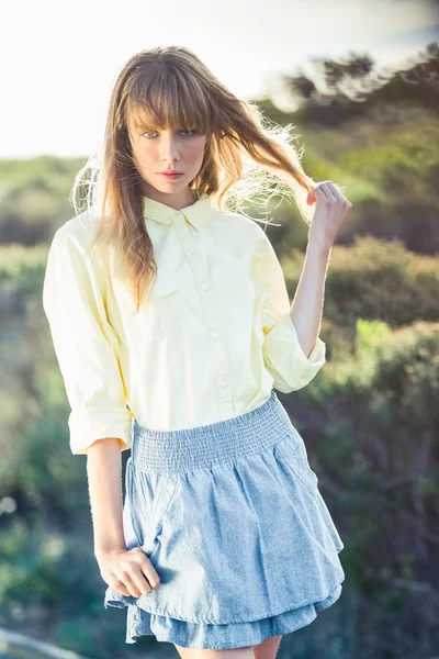 Stylish gorgeous blonde on the roadside posing — Stock Photo, Image