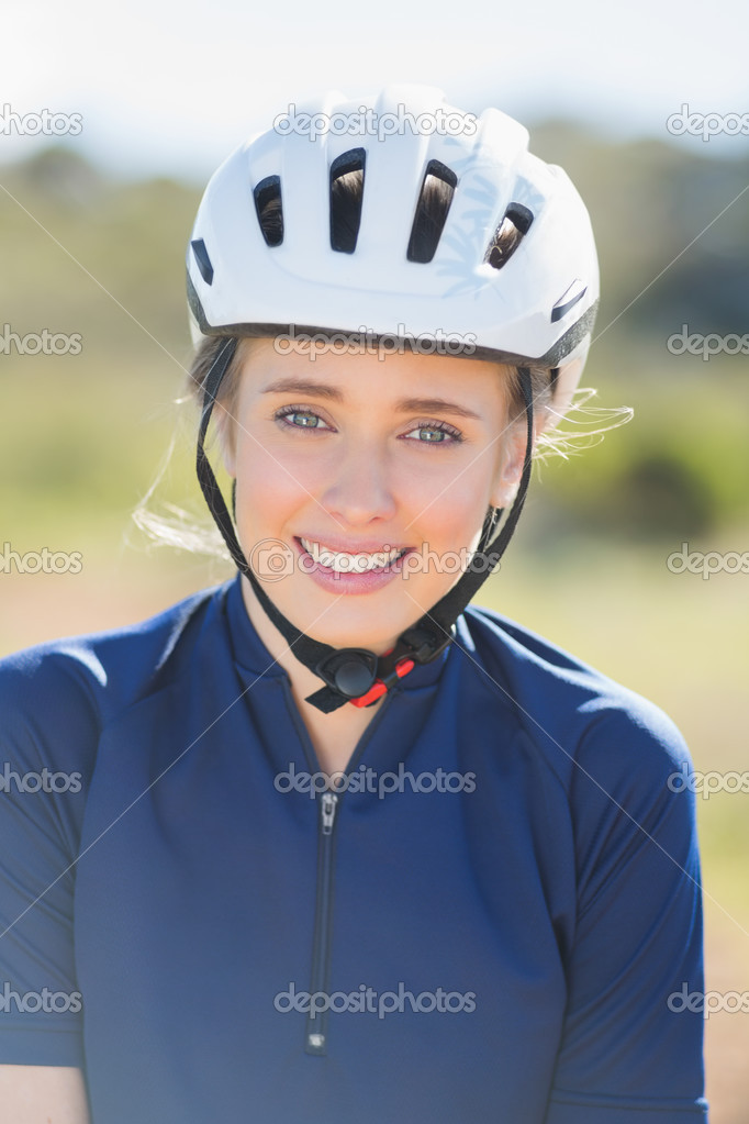 Close up of woman wearing bike helmet