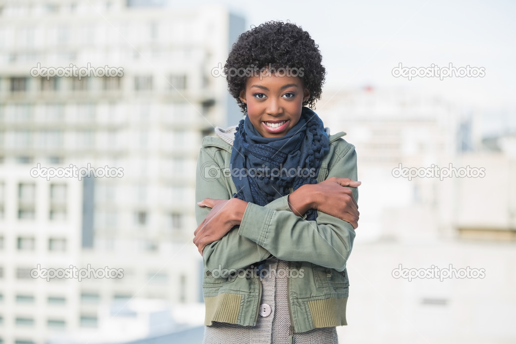 Shivering casual woman posing outdoors