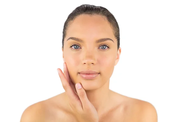 Cheerful woman touching her cheek — Stock Photo, Image