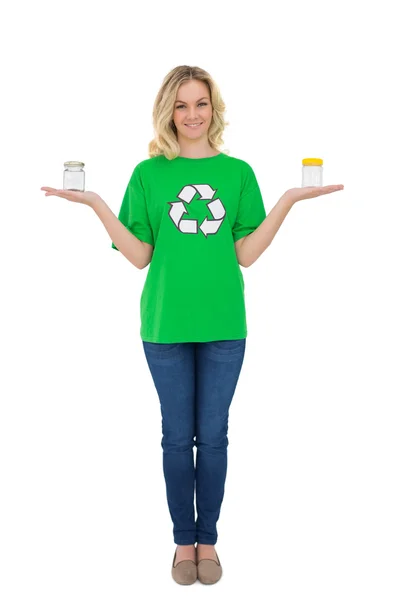 Smiling cute environmental activist holding glass jars — Stock Photo, Image