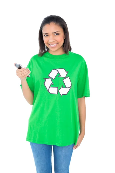 Content environmental activist holding a mobile phone — Stock Photo, Image