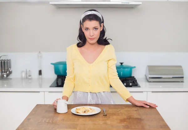 Serious gorgeous model having dessert posing — Stock Photo, Image