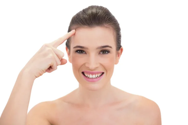Pleased model touching her brow — Stock Photo, Image