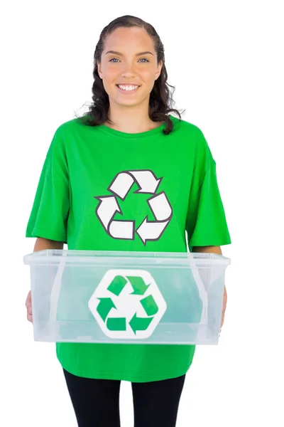 Enivromental activist holding box of recyclables — Stock Photo, Image