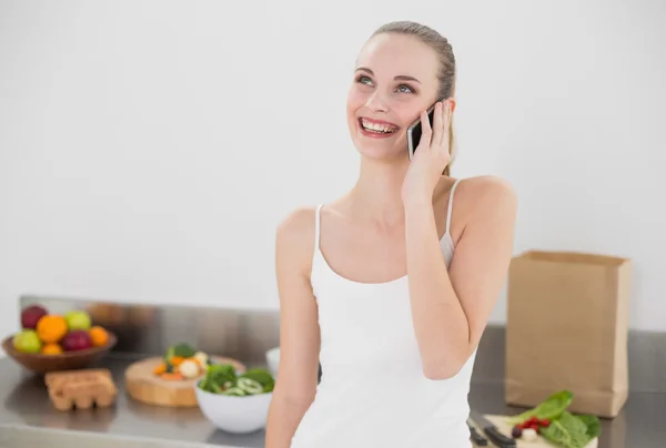 Happy young woman on the phone — Stock Photo, Image
