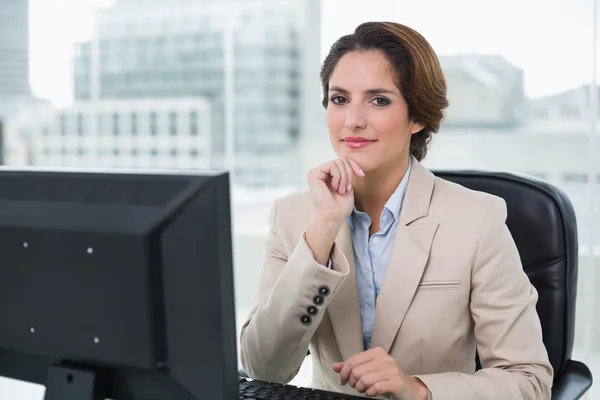 Content businesswoman looking at camera — Stock Photo, Image