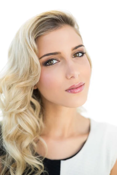 Slightly content smiling blonde model — Stock Photo, Image