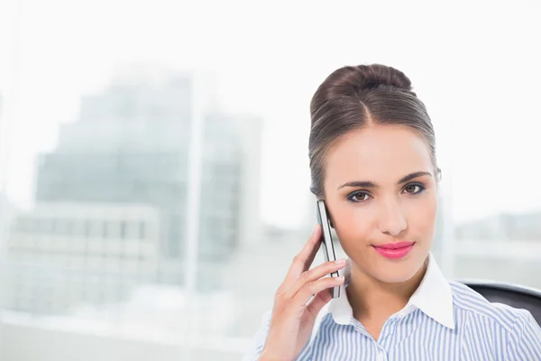 Businesswoman phoning with smartphone — Stock Photo, Image