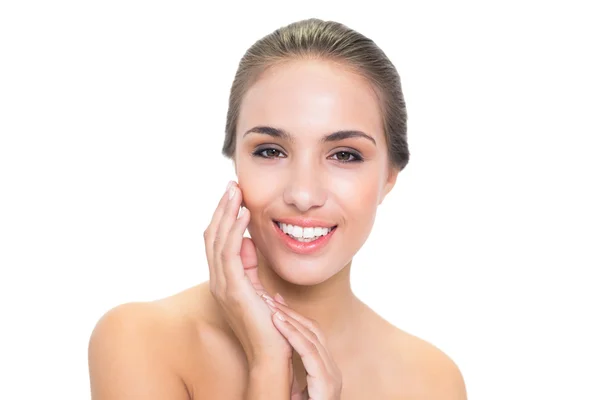 Cheerful young woman looking at camera — Stock Photo, Image