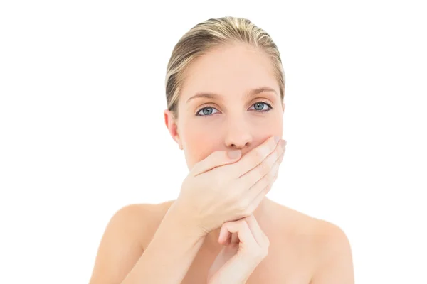 Pretty fresh blonde woman covering her mouth — Stock Photo, Image