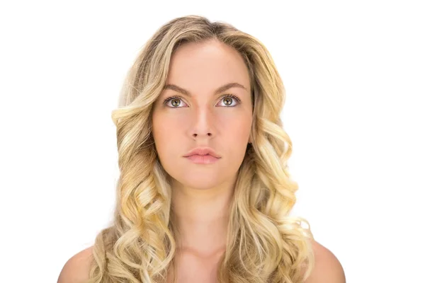 Thoughtful curly haired blonde posing — Stock Photo, Image