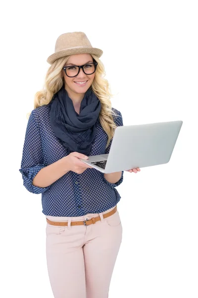 Cheerful trendy blonde holding laptop — Stock Photo, Image