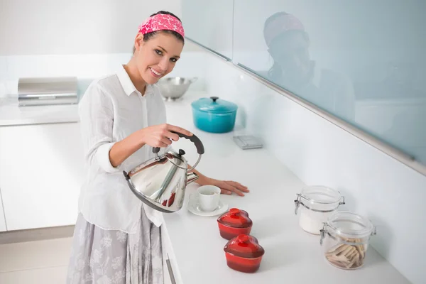 Content gorgeous woman preparing tea — Stock Photo, Image