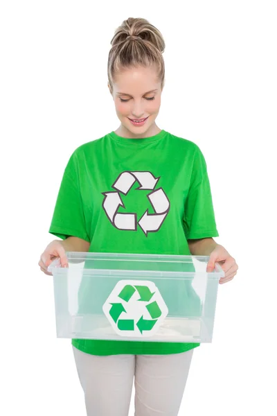Smiling environmental activist holding recycling box — Stock Photo, Image