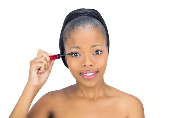 Happy woman using mascara for her eyelashes — Stock Photo, Image