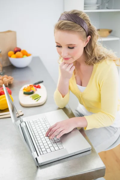 Content pretty blonde using laptop — Stock Photo, Image