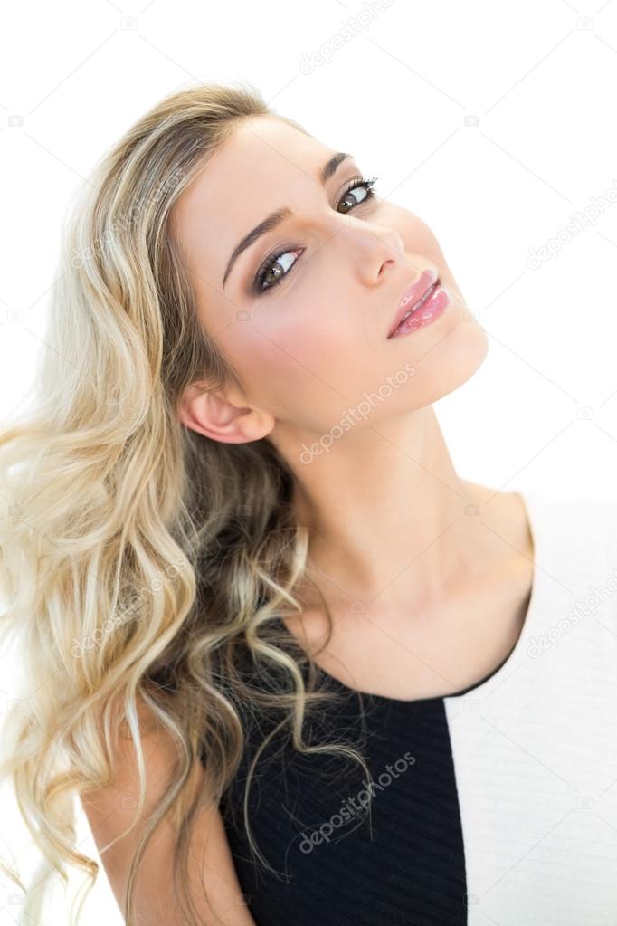 Content blonde model tilting her head