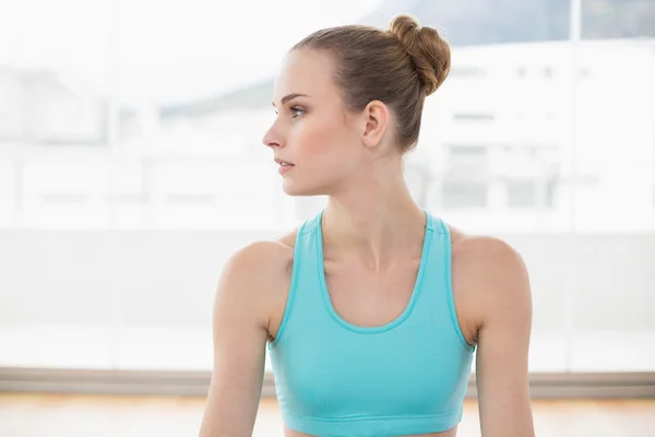 Sporty calm woman looking away — Stock Photo, Image