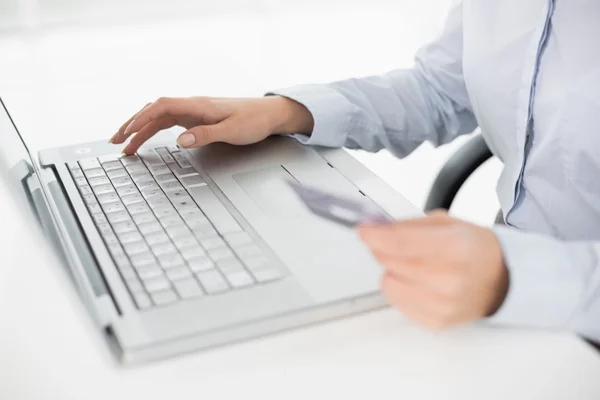 Close-up mid section of a woman doing online shopping — Stock Photo, Image