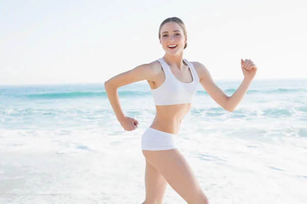 Cheerful slender woman running — Stock Photo, Image