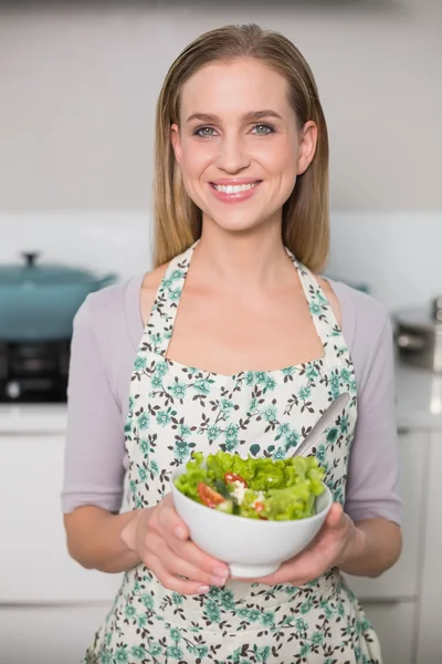 Happy gorgeous model holding salad bowl — Stock Photo, Image
