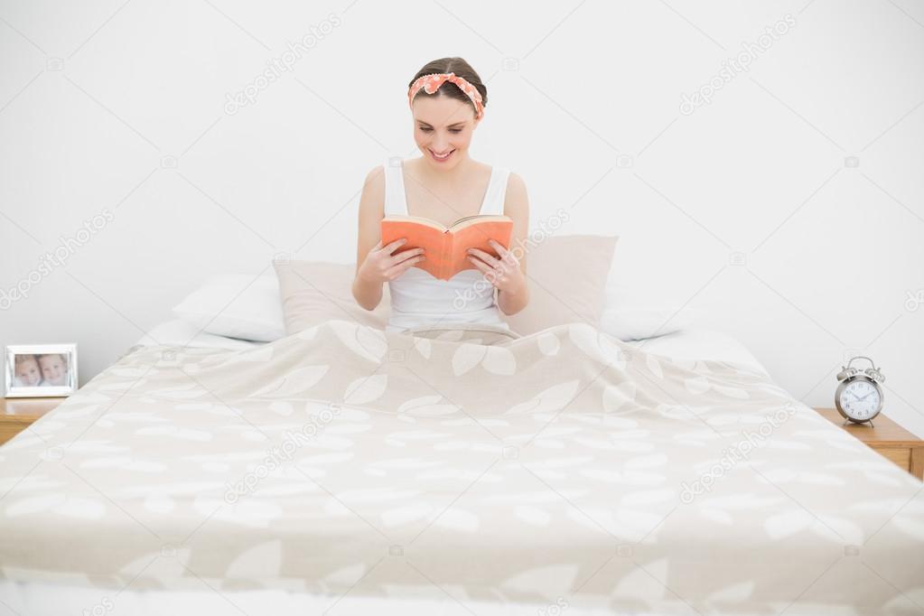 Pretty woman reading a book