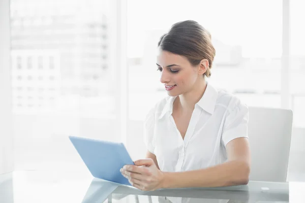 Content businesswoman working with her tablet — Stock Photo, Image