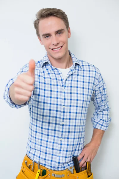 Portrait of a handyman gesturing thumbs up — Stock Photo, Image