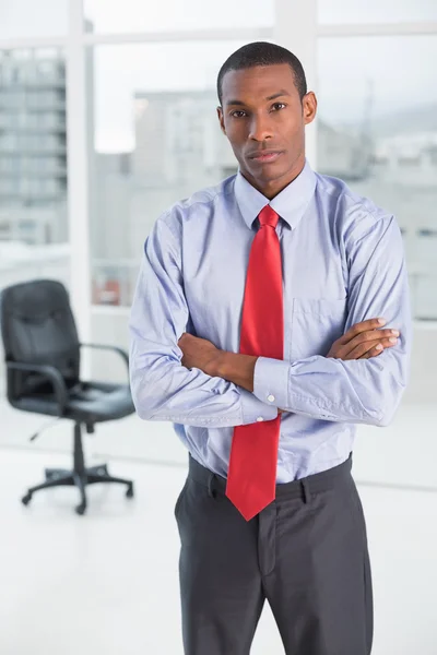 Elegant serious Afro businessman in office — Stock Photo, Image