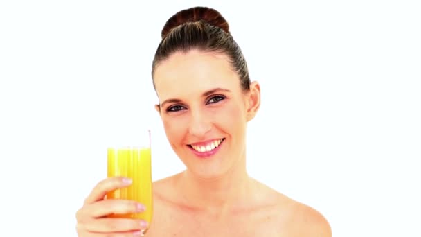 Pretty woman drinking orange juice — Stock Video