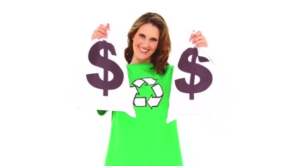 Smiling environmental activist showing money bags — Stock Video