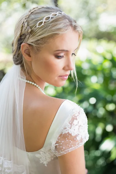 Blonde bride in a veil rear view — Stock Photo, Image