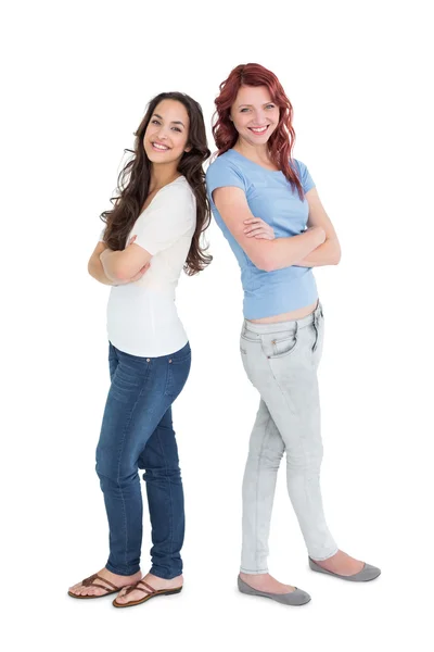 Portrait of two female friends with arms crossed — Stock Photo, Image