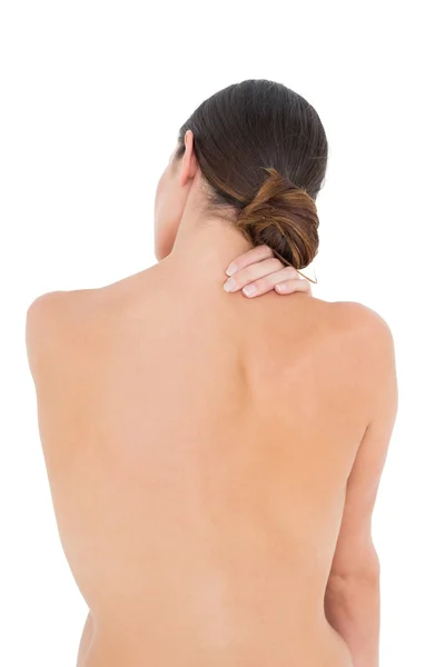 Vista trasera de una mujer en forma de topless con dolor en el hombro — Foto de Stock