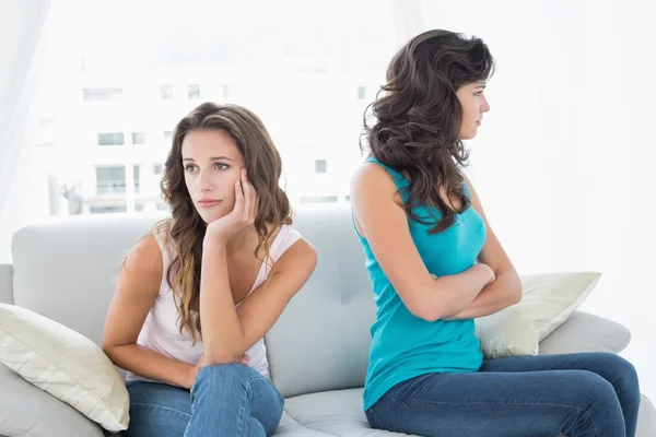 Unhappy friends not talking after argument at home — Stock Photo, Image